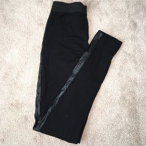 High waisted skinny black pant with leather detail